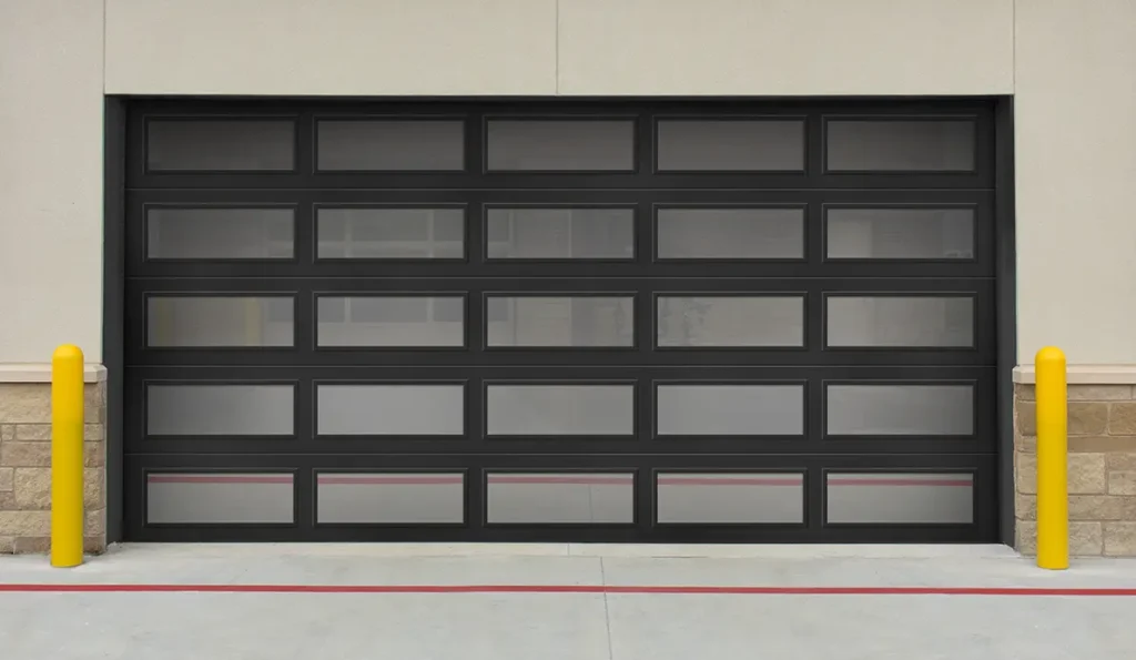 Clopay Architectural Series steel commercial overhead door on an auto body shop